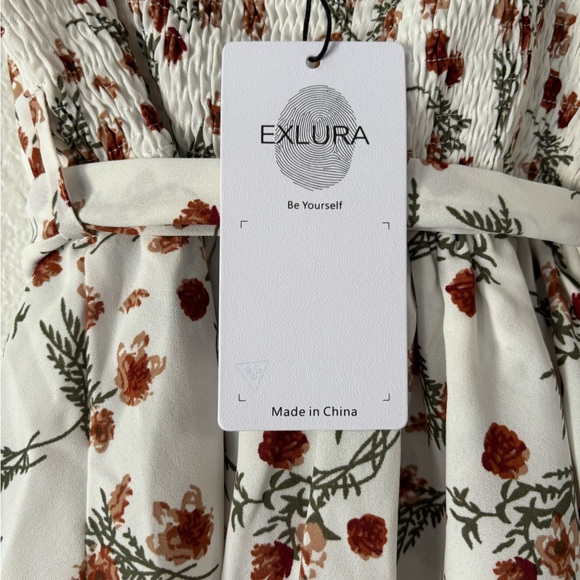 Exlura Floral Tiered Ruffle Smocked Shorts Romper - Picture 7 of 12